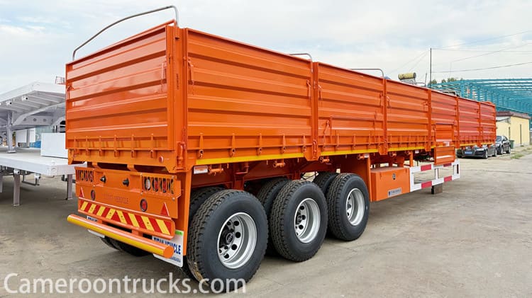 1. What is a trailer side boards? Semi cargo trailer side boards play a vital role in Cameroon's logistics and transportation industry. Semi cargo trailer side boards not only provide a solid protective barrier for the transported goods, but also ensure that the goods can reach their destination safely and intact during the long journey. Whether it is agricultural products, minerals or other industrial products, semi cargo trailer side boards have become an indispensable part of Cameroon's cargo transportation with their sturdy and durable characteristics.  Cameroon's semi cargo trailer side boards are usually made of high-quality metal or composite materials, which not only have excellent strength and durability, but also can resist the potential threats to goods from bad weather and road conditions. In addition, the design of semi cargo trailer side boards also fully considers Cameroon's complex geographical environment and changeable climatic conditions to ensure stable and reliable protection for goods under various road conditions. Therefore, in the field of logistics and transportation in Cameroon, semi cargo trailer side boards have become an important tool to improve transportation efficiency and reduce the risk of cargo loss.  2. What is the difference between curtain side and semi cargo trailer? First, the main feature of curtain side trailers is that their sides are covered with sliding curtains or canvas, which makes loading and unloading cargo more convenient and quicker. The curtains can be opened or closed quickly, without the need to manually open or close the side boards like with a flatbed trailer. In addition, curtain side trailers are usually lighter, which helps save fuel and improve transportation efficiency. In contrast, semi cargo trailers have more sturdy side boards, which are usually made of metal and provide higher cargo protection. Semi cargo trailers are more suitable for transporting heavy or fragile cargo because the side boards can effectively prevent the cargo from shifting or being damaged during transportation. However, semi cargo trailers may require more time and manpower when loading and unloading cargo because the side boards need to be opened and closed.  3. What is a trailer side boards used for? In Cameroon, trailer side boards are widely used in the transportation of various goods to provide necessary protection and support for the goods. These side boards are usually made of strong and durable materials such as metal or reinforced plastic to ensure that the goods can be effectively protected from the external environment during long-distance transportation, such as wind, rain, sun or theft. Whether it is agricultural products, building materials, or heavy machinery and equipment, trailer side boards can provide a stable and reliable loading space to ensure that the goods can arrive at the destination safely.  Cameroon's trailer side boards are flexible in design and can be adjusted according to the size and shape of different goods. Some side boards can even be folded or disassembled to meet the transportation needs of special goods. This not only improves transportation efficiency, but also reduces logistics costs. In addition, the trailer side boards also have certain anti-theft functions, which can effectively prevent the theft of goods during transportation, providing a safer and more reliable solution for Cameroon's cargo transportation industry. In Cameroon's logistics transportation, trailer side boards have become one of the indispensable means of transportation.